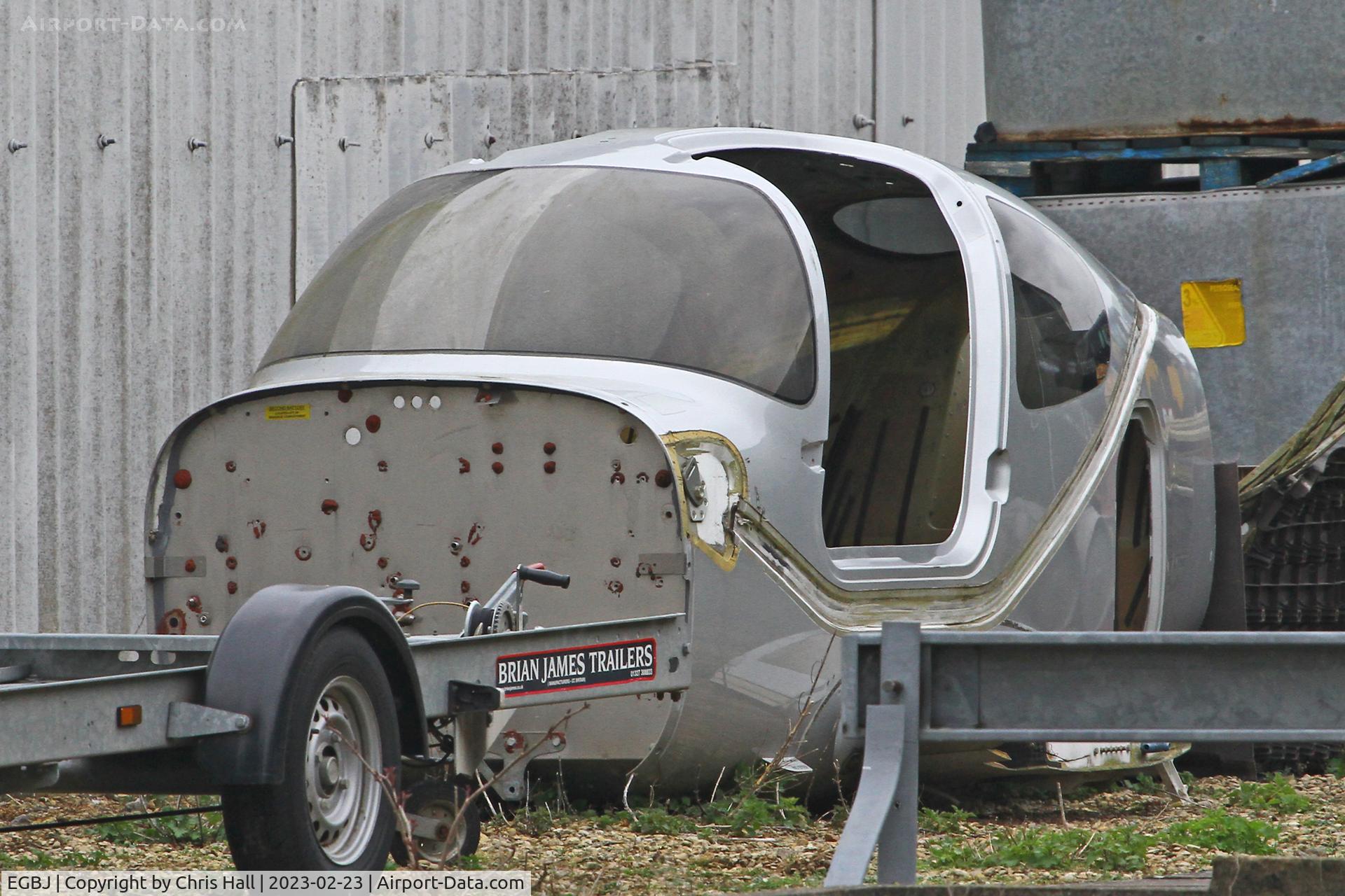 Gloucestershire Airport, Staverton, England United Kingdom (EGBJ) - Cirrus fuselage at Staverton