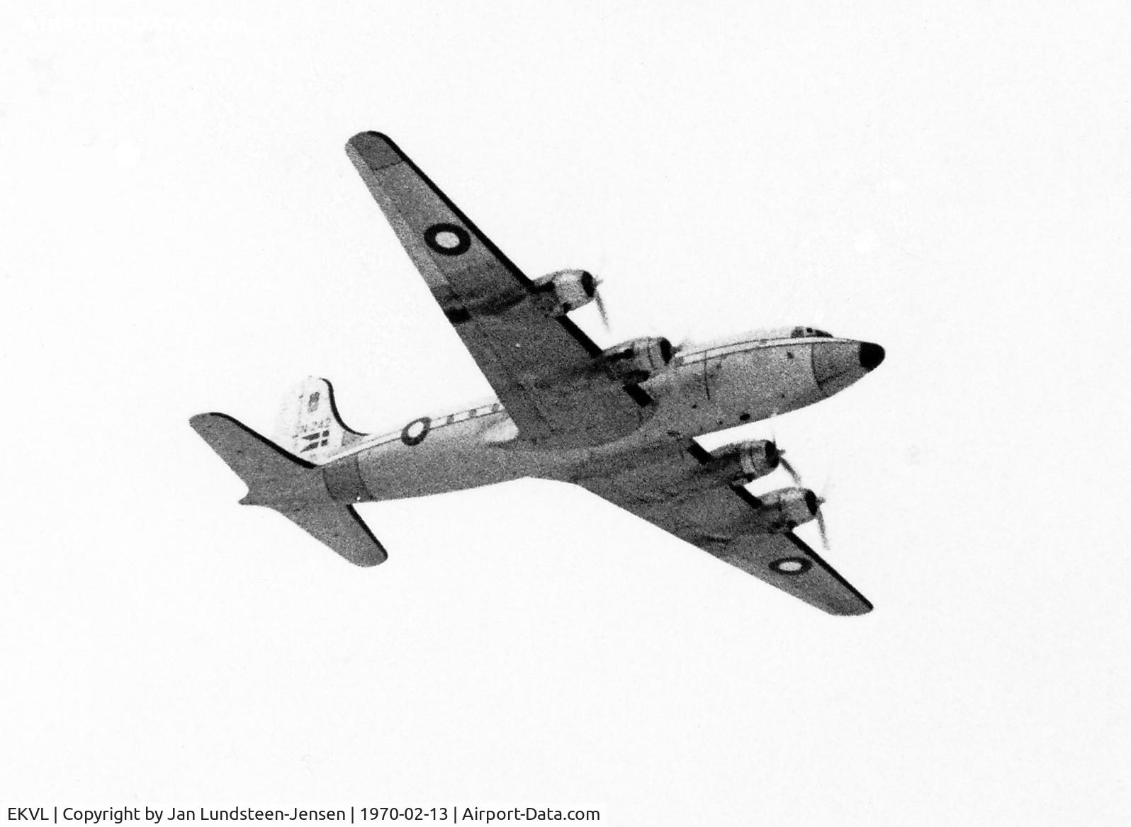 EKVL Airport - Douglas C-54D of Royal Danish Air Force seen shortly after takeoff from Runway 10 at Vaerloese Air Base in Denmark. All RDAF transport aircraft were based at Vaerloese from 1956 to 2004.