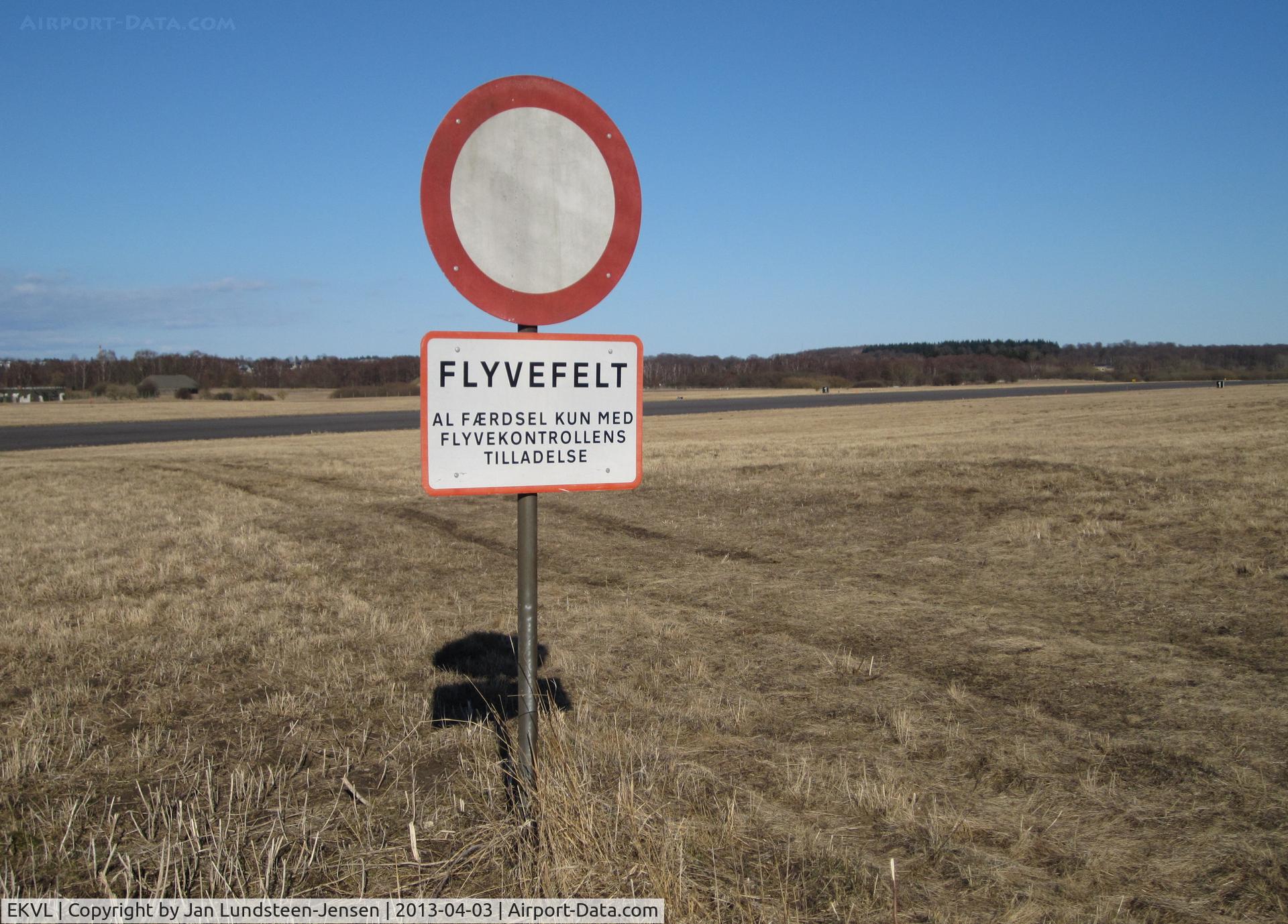 EKVL Airport - Access Only With ATC Permission-sign at the runway at the closed Vaerloese Air Base in Denmark. The sign was later removed. 