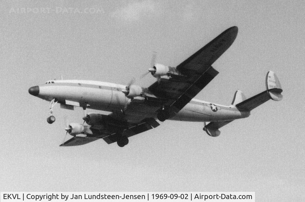 EKVL Airport - Lockheed VC-121J Super Constellation from US Navy Keflavik on final approach to Runway 28 at Vaerloese Air Base in Denmark in 1969. The aircraft had a medium blue cheatline.