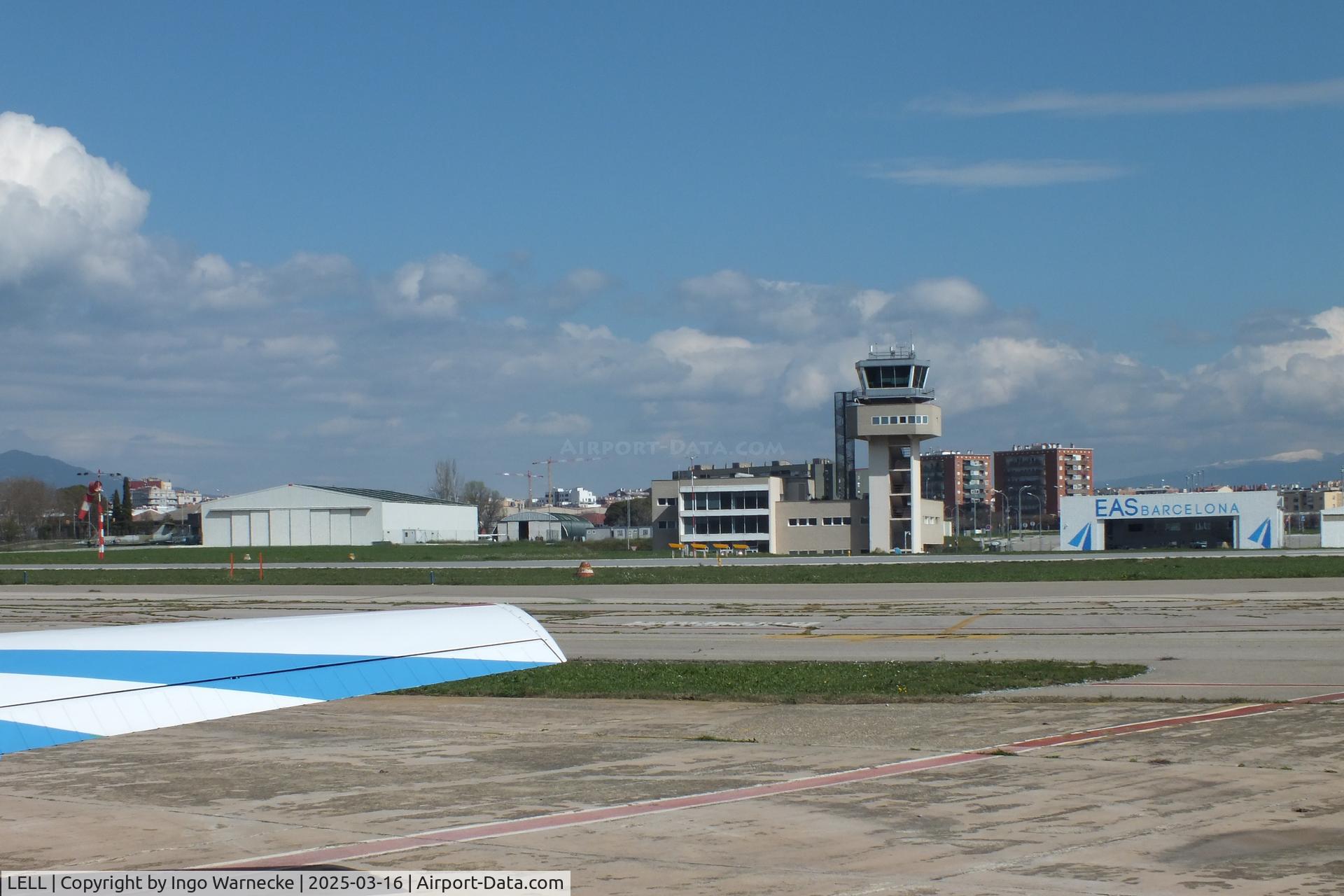 LELL Airport - tower and western hangars in the northern part of Sabadell airport