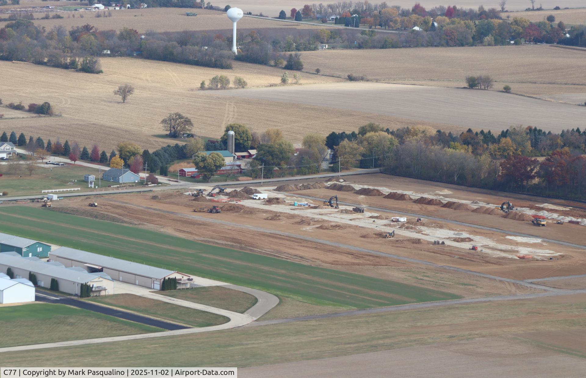 Poplar Grove Airport (C77) - New hangar homes going up on the north side