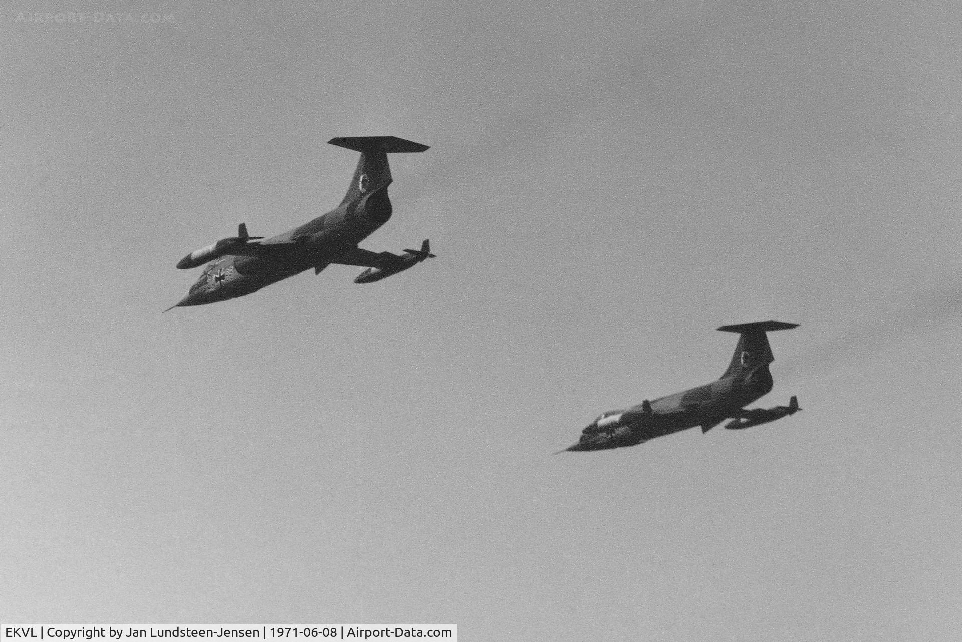 EKVL Airport - Two Lockheed RF-104G Starfighters of West German Air Force unit AG 52 seen shortly before flying a low pass over Runway 28 at Vaerloese Air Base in Denmark in 1971.