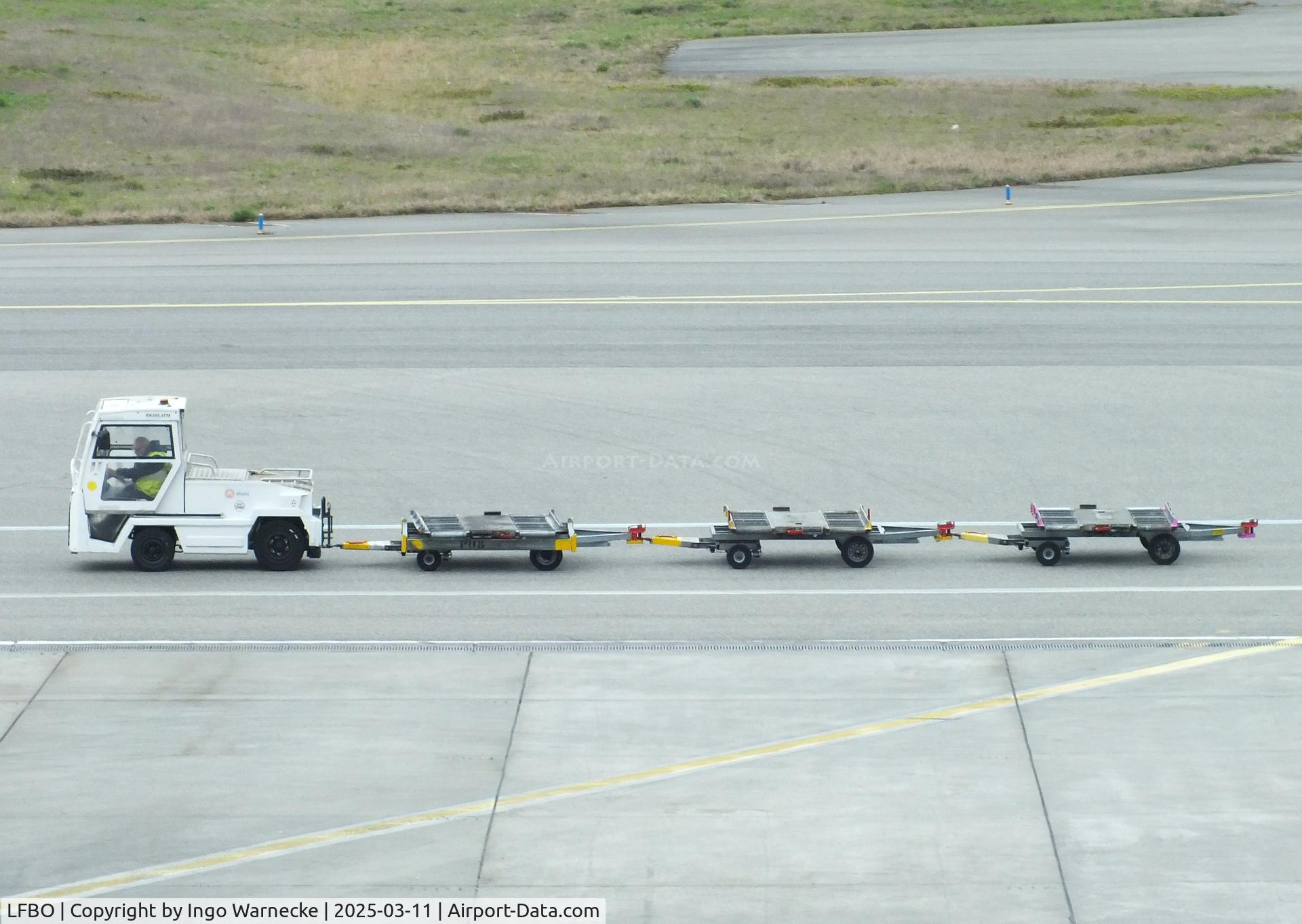 Toulouse Airport, Blagnac Airport France (LFBO) - light tow vehicle with cargo-trailers at Toulouse-Blagnac airport