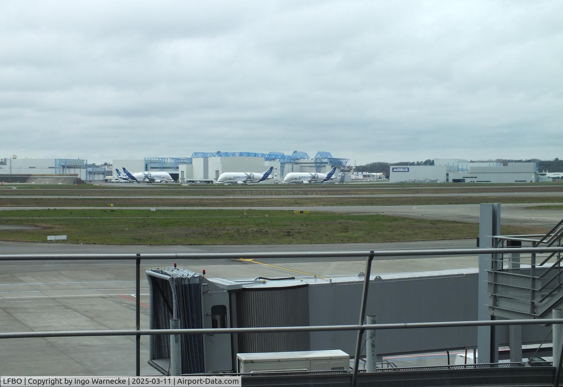 Toulouse Airport, Blagnac Airport France (LFBO) - looking from the terminal across apron / runways towards the Airbus facilities at Toulouse-Blagnac airport