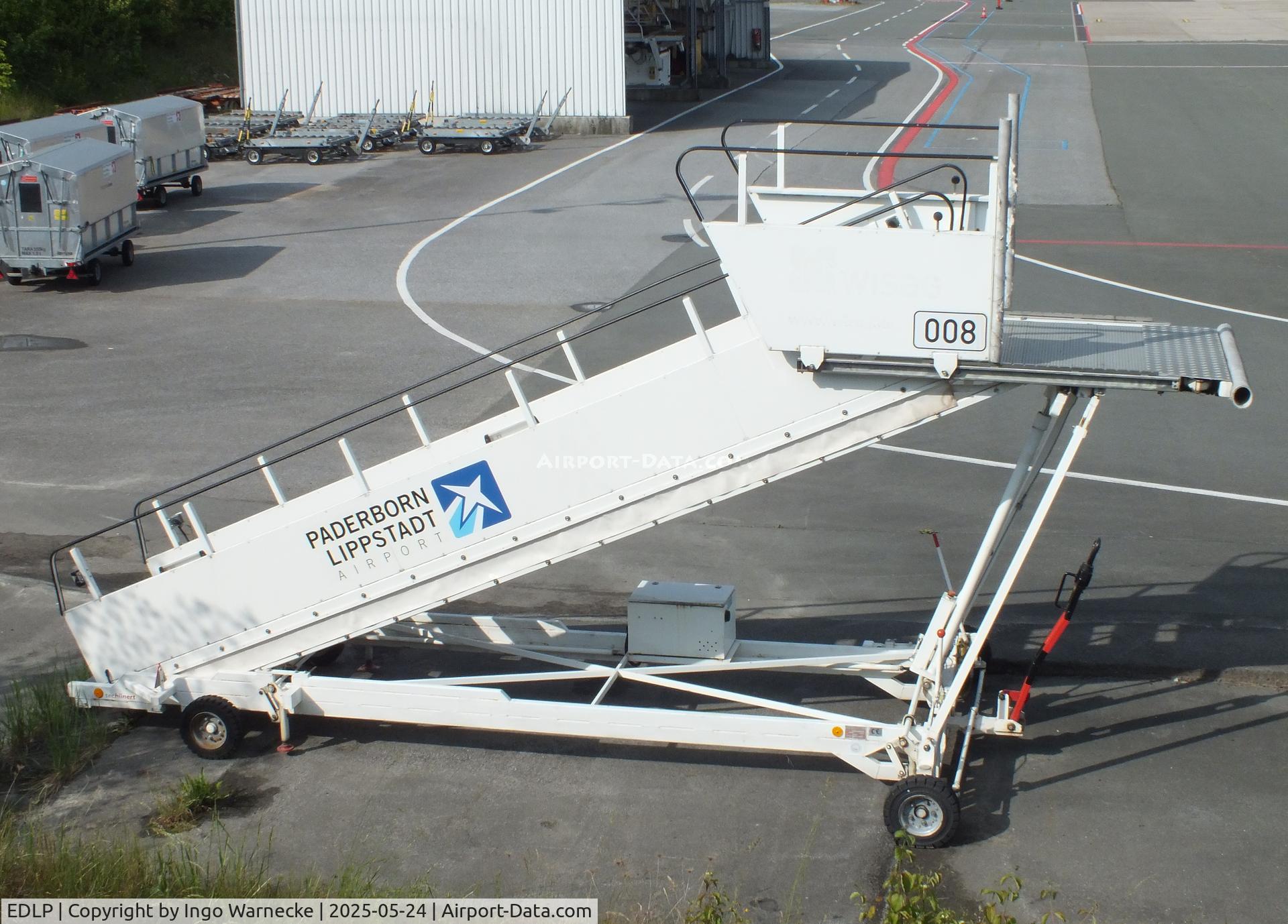 Paderborn Lippstadt Airport, Paderborn / Lippstadt Germany (EDLP) - towed open boarding-stairs at Paderborn-Lippstadt 'Heinz Nixdorf' airport, Büren